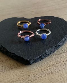 Beautiful handmade rings made with genuine high quality 6 mm fire agate wrapped in quality wire of your choice including gold, antique copper, silver or rose gold.  Sturdy and strong.  Exquisite.  Great for stacking.  Various sizes. Agate is believed to bring longevity and protection.  Birthstone Gemini. Makes a lovely unique gift for that special person who likes something different. Beautifully gift wrapped with a card detailing the gemstone properties. Posted in a protective envelope. Free fi Fire Agate Ring, Ring Wire, Gemstone Properties, Wire Wrapped Ring, Fire Agate, Wire Wrapped Rings, Handmade Rings, Agate Ring, Blue Fire