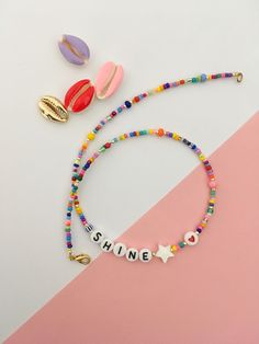 This fun and colourful personalized beaded necklace is a chic detail to your everyday style or as a gift to a loved one. Layer it up with more necklaces for a rich look or wear it alone for a clean and chic style. 🔸 CHOOSE YOUR LETTERS If you want a different word, please write this in the message to seller box when you check out. If you want a personalized necklace in different colours or other changes made, please send me a message. I'm happy to make a special piece for you. SPECIFICATIONS: M Cheap Red Beaded Necklace With Letter Beads, Cheap Blue Beaded Necklace With Letter Beads, Trendy Everyday Customizable Necklaces, Trendy Summer Beaded Necklaces With Letter Beads, Customizable Trendy Necklaces For Birthday, Customizable Trendy Necklace For Birthday, Trendy Customizable Necklaces For Birthday, Trendy Summer Beaded Necklace With Letter Beads, Trendy Handmade Birthday Necklaces