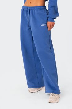 PRODUCT INFO Sweatpants Low rise waist Adjustable waistband Wide leg Embroidered logo Matching set Cotton, Polyester Model wears size S Model height is 5'9 Item care: Wash with similar color Matching Set Outfit Sweats, Wide Sweatpants, Sweatpants Blue, Cute Sweats, 2024 Wardrobe, Cute Sweatpants, Blue Sweatpants, Wardrobe Wishlist, Wide Leg Sweatpants