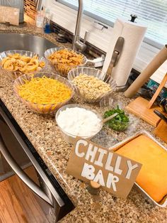 a counter topped with lots of different types of food