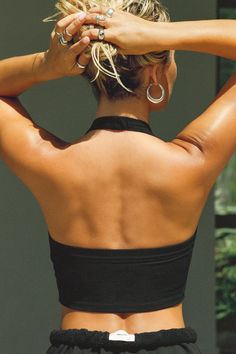 Cropped halter tank with a scoop neckline. Our FlexRib® fabric was designed with function and comfort in mind. It's soft, stretchy and made to move with you. You'll want to wear it all day, every day. Color: Black FlexRib® Sizing: X/S (0-2), S/M (4-6), M/L (8-10) Model is 5'8" and wearing size S/M Fabric: 90% Rayon, 10% Spandex Care: Machine Wash Cold With Like Colors.Care: Lay Flat to Dry. JOAH BROWN | MADE IN LOS ANGELES Joah Brown, Halter Tank, Tristan Da Cunha, Swim Accessories, Caicos Islands, Pitcairn Islands, Papua New Guinea, Equatorial Guinea, Turks And Caicos Islands