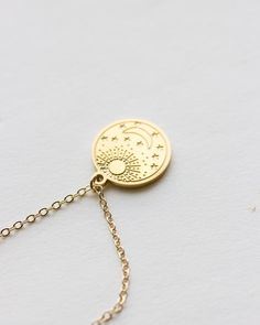 Delicate Gold Moon Jewelry, Delicate Gold Moon-shaped Jewelry, Dainty Gold Moon Jewelry, 14k Gold Filled Moon Jewelry Gift, Celestial 14k Gold Charm Necklaces, Celestial 14k Gold Charm Necklace, Gold Charm Necklaces With Moon Phase As Gift, Celestial Gold Jewelry With Sun And Moon Design, Celestial Yellow Gold Charm Necklaces