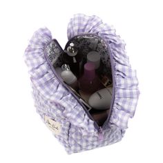 Our Coquette Large Makeup Bag is a stylish and spacious carry-all designed to hold all your essentials with a classic look.   The quilted exterior is made from a beautiful lilac gingham material, complemented by matching lilac ruffles and a matching floral interior.   Perfect for organizing your makeup and beauty essentials or serving as a travel organizer (it fits seamlessly inside a suitcase), this bag is a must-have for those who appreciate both organization and style.   Size: 10" x 6" x 6" ( Makeup Bag Aesthetic, Lilac Gingham, Cute Makeup Bag, Large Makeup Bag, Floral Interior, Travel Organizer, Beauty Essentials, Makeup Yourself, Classic Looks