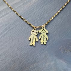 This necklace is a wonderful gift for both wife's mom and grandmother.Necklace can be ordered with multiple personalized boy or girl charms depending on your choice. And then you can engrave each child's charm with the name of the child it represents! It's easy to personalize it with a boy, girl or both pendant, just choose up to five pendants and add the names or important words for mom.This is a perfect necklace for moms everywhere! About Custom: 1. Select the color/ placement. Engraving can b Words For Mom, Grandmother Necklace, Name Pendant, Wife Gift, Engraved Necklace, Girls Jewelry, Grandma Gifts, Boy Girl, Kids Boys