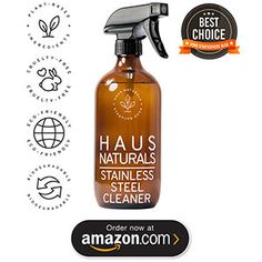 a bottle of shampoo with the words haus naturals on it and an orange ribbon