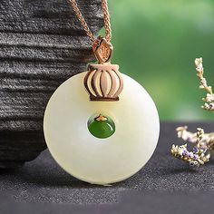 * INTRODUCTION--- Introducing the exquisite Genuine White and Green Nephrite Jade Crown Necklace Pendant a true embodiment of elegance. Crafted with the utmost precision and attention to detail, the pendant features genuine white nephrite jade with a vibrant green jade on top. The pendant comes complete with a crown accent to complement the overall aesthetic. This remarkable piece is not only an exquisite display of nature's finest elements, but it's the ideal choice for special occasions or as Crown Pendant, Crown Necklace, Crown Design, Nephrite Jade, Jade Jewelry, Jade Beads, Traditional Jewelry, Green Jade, Gemstone Bracelets