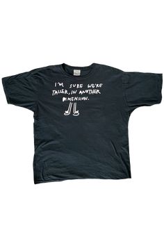 ✰I'm Sure We're Taller in Another Dimension✰UNISEX✰Hand drawn and designed✰Super soft and comfy!✰Model is 5'8 and wearing Size L T shirt I'm Sure We're Taller In Another Dimension, Relaxed Fit Printed Band Merch Tops, Funny Relaxed Fit Text Print Tops, Funny Slogan Tops With Relaxed Fit, Funny Graphic Relaxed Fit Tops, Funny Graphic Design Tops With Relaxed Fit, Funny Graphic Summer Tops, Funny Cotton Shirt With Graphic Design, Band Merch Cotton Top With Funny Print