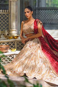 A gold tissue lehnga and choli features detailed zardoze and resham embroidery and is paired with a contrasting crimson cotton net dupatta adorned with gold zardoze borders and sequins. Punjabi Suit Boutique, Resham Embroidery, Groom Outfit, Net Dupatta, Punjabi Suits, Guest Outfit, Wedding Guest Outfit, Wedding Guest, Borders