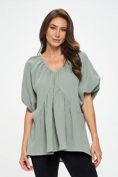 Made in USA Cotton V neck Puff Sleeve Tunic Top. Fabric content: 100% Cotton. Available in other colors. Style: casual, formal Print / Pattern: solids Silhouette: oversized Fit: oversized Neck Line: v neck Sleeve: shortsleeve Lining: no Made In: Made in U.S.AFabric Contents: 100% Cotton.Size Measurement (inch): S: 18.5 (Bust), 21.0 (Waist), 27.0 (Hips), 28.0 (Length) M: 19.5 (Bust), 22.0 (Waist), 28.0 (Hips), 28.5 (Length) L: 20.5 (Bust), 23.0 (Waist), 29.0 (Hips), 29.0 (Length) Casual Billowy V-neck Tops, Oversized Summer Tops With Lantern Sleeves, Oversized Lantern Sleeve Tops For Summer, Spring Oversized Blouse In Solid Color, Oversized Solid Color Tops For Spring, Chic Green Puff Sleeve Top, Versatile Spring Blouse In Solid Color, Versatile Blouse For Spring, Billowy Casual Tops For Workwear