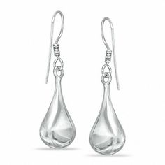 Trendy yet timeless, these modern teardrop earrings are a great look anytime. Fashioned in sterling silver, each dimensional elongated and widened teardrop is finished with a polished shine and suspends from a French wire back. Modern Hypoallergenic Teardrop Jewelry, Elegant Long Drop Teardrop Earrings With Polished Finish, Silver Teardrop Earrings With Polished Finish, Elegant Sterling Silver Teardrop Earrings With Polished Finish, Modern Silver Teardrop Earrings, Formal Sterling Silver Teardrop Earrings With Polished Finish, Silver Teardrop Earrings With Polished Finish For Gift, Formal Sterling Silver Teardrop Earrings, Elegant Polished Teardrop Drop Earrings