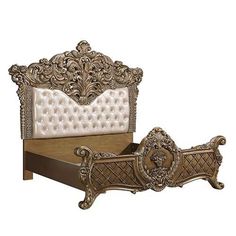 an ornate gold bed frame with white upholstered mattress