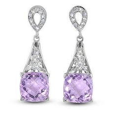 METAL SPECIFICATIONS Metal Name: White Gold 14K STONE SPECIFICATIONS Stone Name: KUNZITE / DIAMOND Stone Cut : Cushion and Round cut Stone Specifications: There is one kunzite approx. 13.00 carats (Approx. Size 13.4 x 13.4 mm) and approx. 0.35 carats of smaller round diamonds on the side in each earring. Natural earth-mined stones. Total Stone Weight : approx. 26.70 carats Color : Pink/F Clarity : AAA/VVS1 APPRAISAL Appraised Value : $19500.00 Comes with Certificate Luxury Diamond Earrings With Gemstones For Formal Occasions, Luxury Diamond Gemstone Earrings For Formal Occasions, Dazzling White Gold Diamond Earrings With Gemstone, Wedding Dangle Jewelry With Pave Setting, Formal Platinum Earrings With Gemstone, Dazzling Diamond Gemstone Earrings For Formal Occasions, Dazzling Diamond Gemstone Earrings For Formal Events, Formal Platinum Gemstone Earrings, Dazzling White Gold Diamond Gemstone Earrings