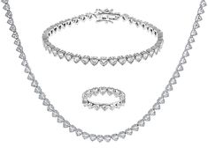 Bella Luce® white diamond simulant 28.56ctw heart, rhodium over sterling silver jewelry set. Ring Measures approximately 0.88" L x 0.13" W and is not sizeable. Tennis Necklace measures approximately 18.00" L x 0.13" W and has a box clasp. Tennis bracelet measures approximately 7.25-8" L x 0.13" W and has a hidden box clasp. The diamond equivalent weight is 17.30ctw. Silver Heart Jewelry, Heart Jewelry Set, Silver Jewelry Set, Silver Jewellery Sets, Diamond Simulant, Box Clasp, Set Ring, Tennis Necklace, Sterling Silver Heart