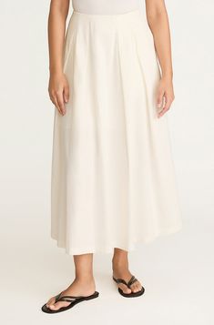 In an ottoman fabric, this full, pleated midi skirt has a high Hollywood waist and on-seam pockets. Chic A-line Maxi Skirt For Daywear, Elegant A-line Pleated Skirt For Daywear, Daywear A-line Lined Skirt, Chic A-line Maxi Skirt With Relaxed Fit, Elegant A-line Maxi Skirt With Pleated Hem, Voluminous A-line Skirt With Pleated Hem, Flowy A-line Maxi Skirt With Pockets, White Flowy Pleated Midi Skirt, Daywear Flared Skirt With Pockets