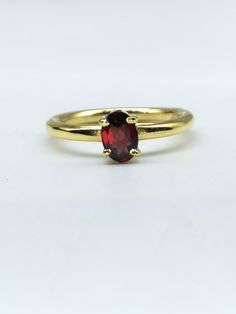 Natural Garnet Ring-Oval Garnet Ring-Dainty Garnet Ring-Stackable Ring-Sterling Silver Ring-14k Solid Gold Ring-Birthstone Gift-Gift For Her Personalization: Possible About The Ring:- Main Gemstone - Natural Garnet Gemstone Shape - Oval Main Stone Size - 5x7mm        Setting Type - Prong Setting [Message us if you want to get this ring design to be made in a different gemstone, especially for you] Purity - Silver and plating options-(925/1000 also known as 92.5%/Sterling Silver) Gold Variations Heirloom Garnet Oval Birthstone Ring, Oval Gemstone Gold Stackable Rings, Classic Oval Stackable Rings, Classic Oval Stackable Rings With Bezel Setting, Gold Oval Stackable Birthstone Ring, Gold Oval Birthstone Stackable Ring, Dainty Oval Stackable Birthstone Ring, Elegant Oval Ruby Stackable Ring, Oval Stackable Birthstone Ring In Fine Jewelry Style