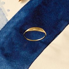 The Tiny Signet Ring is the pinnacle of minimalist design and elegant rings. Its plainness with glamorous modesty will fascinate people around you. It is perfect for everyday use and ring stacking. - Made in 14k Solid Gold - Band Width: 1.26 mm / 0.04 inches- Top Width: 3.30 mm / 0.12 inches- Thickness: 1.06 mm / 0.04 Modern Stackable Rings In Recycled Gold With Polished Finish, Modern Everyday Stackable Rings With Round Band, Modern Recycled Gold Signet Ring, Modern Stackable Midi Rings For Formal Occasions, Modern Recycled Gold Signet Ring For Promise, Yellow Gold Open Band Signet Ring For Everyday, Modern 14k Gold Stackable Rings With Round Band, Modern 14k Gold Stackable Rings, Modern 14k Gold Stackable Round Band Rings