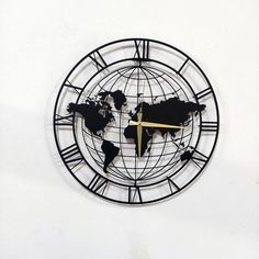 a clock that has a world map on it