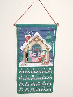 a christmas banner hanging on the wall with an image of a man and woman in front of a church