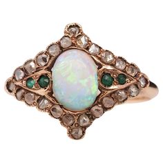 Year: 1900s Item Details: Ring Size: 6 Metal Type: 14K Yellow Gold [Hallmarked, and Tested] Weight: 2.7 grams Diamond Details: .25ct total weight, rose cut diamond, natural diamonds, I/J Color, VS clarity Center Stone Details: Australian Opal, Natural, 8mm long, 1.50ct approximate, great color play. Band Width: 2mm Condition: Excellent Rose Cut Ring, Art Nouveau Ring, Rosecut Diamond Ring, Australian Opal, Dream Jewelry, Rose Cut Diamond, Cocktail Rings, Rose Cut, Jewelry Art