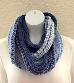 I knit this pretty Infinity scarf Cowl in 100% Acrylic  yarn in Shades of Blue yarn Medium weight cowl. Pretty eyelet stitch Measures 54" around  X 10" wide. It will stretch some when twisted and wrapped. Wide enough to be pulled up over your head Machine wash cold, dry low heat. Blue Knitted Yarn Scarves, Blue Knitted Yarn Scarf, Casual Blue One Size Knitting Pattern, Blue Knitted Scarves One Size, Blue Knitted Scarf, One Size, Blue Hand Knitted Scarf, Blue Knitted Scarf One Size, Blue Knitted One-size Scarf, Eyelet Stitch