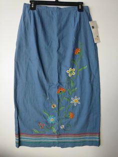 NWT Hearts of Palm SIZE 8 Embroidered Beaded Linen Rayon Blue Floral Skirt  RETAIL PRICE $50.00  Condition is New with tags.  Shipped with USPS First Class Package.  WAIST: 14"  HIPS: 18"  LENGTH: 34" RETAIL PRICE $50.00 VERY GOOD CONDITION.  NEW WITH TAGS. COME BACK SOON AND VISIT.... https://stores.ebay.com/nancysport Traditional Fitted Skirt For Spring, Blue Cotton Bottoms With Embroidered Hem, Summer Embellished Blue Skirt, Spring Bohemian Embellished Skirt, Embellished Blue Skirt For Summer, Summer Blue Embellished Skirt, Bohemian Embellished Skirt For Spring, Traditional Embroidered Spring Skirt, Traditional Embroidered Skirt For Spring