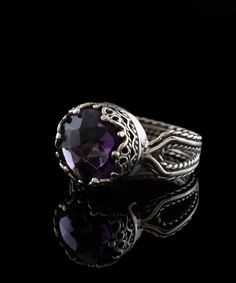 Looking for the perfect gift for your girlfriend, wife, mother, or sister? This gorgeous silver filigree art women's cocktail ring is the ideal choice. With its intricate details and beautiful face-up design, this ring is sure to stand out and make an impression. It features a double-sided, faceted checkerboard round-cut amethyst gemstone that measures 10mm and has a face size of 0.47 inches (12.00mm) in width. Not only is this ring stunning, but it also comes with a velvet pouch, silver polish Luxury Amethyst Ring With Intricate Design, Gift For Your Girlfriend, Silver Cocktail, Silver Polish, Art Women, Sterling Silver Filigree, Crystal Stones, Velvet Pouch, Purple Stones