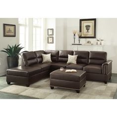 a living room with a sectional couch and ottoman