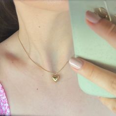 "Puffed Mini Heart Necklace in Gold ✨ Fully stainless steel & tarnish proof! (18k gold plated) 16\" with a 2\" extender  Snake chain style featuring a mini gold puffed heart pendant 🤍 Handmade with love!" Puff Heart Necklace, Puffed Heart Necklace, خواتم خطوبة, Vintage Indian Jewelry, Custom Initial Necklace, Mini Gold, 3d Heart, Puffed Heart, Rings Jewelry Fashion