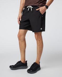 One short for every sport, the Kore Shorts have a classic athletic fit, falling just above the knee with an anywhere and everywhere versatility. Go commando in confidence with the breathable, boxer-brief liner. Also available in 5" and 9" inseam and unlined. | Vuori Kore Shorts | Black | XL Vuori makes premium performance apparel inspired by the active Coastal California lifestyle; an integration of fitness, surf, sport, and art. Breaking down the boundaries of traditional activewear, we are a n Sporty Swim Trunks With Built-in Shorts For Outdoor Activities, Black Swim Trunks With Built-in Shorts For Outdoor Activities, Sporty Outdoor Shorts With Functional Drawstring, Athleisure Athletic Shorts With Built-in Shorts For Outdoor, Outdoor Athletic Shorts With Built-in Shorts In Recycled Polyester, Casual Activewear With Built-in Shorts For Outdoor, Swim Trunks With Built-in Shorts For Outdoor Activities, Recycled Polyester Athletic Shorts With Built-in Shorts For Outdoor, Outdoor Athletic Shorts With Built-in Liner From Recycled Polyester