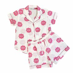 "Celebrate your Phi Mu sisterhood!  Every single print has been block printed by HAND by our amazing artisans and each pajama is individually sewn. These short sleeve / shorts are amazingly comfy and adorable all at the same time.  Details such as the piping and pockets make these pajamas perfect to lounge in, sleep in, or just about do anything in!   100% lightweight cotton with hand block printed design True to size, shorts come with elastic waist and pockets Size US Ladies Size Bust XS 0-2 34\" S 4-6 36\" M 8-10 38\" L 10-12 41\" XL 12-14 45\"     Care & Cleaning: wash cold with like colors in delicate cycle.  Best to line dry." Printed Cotton Pajama Shorts For Sleep, Cute Cotton Pajama Shorts With Relaxed Fit, Printed Cotton Pajama Shorts For Bedtime, Cotton Printed Pajama Shorts For Bedtime, Pink Short Sleeve Home Sets, Cotton Printed Pajama Shorts For Sleepover, Cotton Short Set For Sleepover, Cotton Graphic Print Sleepwear For Pajama Party, Pink Short Sleeve Sleep Set