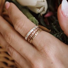 Mother's Day Gift | Personalized stackable ring set, engraved with a name, date, or special word.  Metal: 14k gold filled, .999 fine silver, 14k rose gold filled Dimensions: 2mm tall on average, but our rings are handmade so variations will occur.  Font: lowercase typewriter Unsure what size you need? We highly recommend using our ring sizer for an accurate fit. Some people find that sizing up when stacking 3 or more rings is more comfortable. https://www.etsy.com/listing/239177790/adjustable-ri Stackable Mothers Rings Names, Dainty Personalized Stackable Rings For Mother's Day, Adjustable Stackable Rings With Custom Name For Mother's Day, Personalized Silver Stackable Rings For Mother's Day, Customizable Stackable Rings For Mother’s Day, Personalized Stackable Rings, Stackable Name Rings, Stackable Ring Sets, Mixed Metal Rings