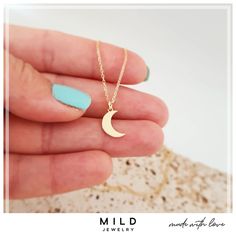 This stunning 14k gold moon necklace is a symbol of femininity and grace. The delicate crescent moon pendant represents the ever-changing and mysterious nature of the moon, making it the perfect accessory for any woman who wants to embrace her own unique beauty. Wearing this necklace is like having a piece of the night sky always close to your heart. The high-polish finish of the pendant and the chain catch the light beautifully and make the necklace sparkle and shine, symbolizing the inner ligh Cresent Moon Necklace, Dainty Moon Necklace, Half Moon Necklace, Pendant Minimalist, Gold Moon Necklace, Moon Bracelet, Moon Gifts, Crescent Moon Pendant, Gold Cross Pendant