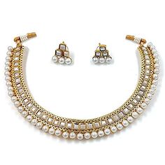 PRICES MAY VARY. Product Dimension :Necklace Length - 4.3 inch x Width - 0.6 inch, Earrings Height - 0.6 inch x Width - 0.5 inch, Weight - 32.23 gms Occasion: Take your style up a notch with this handcrafted piece of jewellery; Enamelled and embellished with rhinestone, crystal, faux pearl, it is perfect for a traditional yet contemporary look Outfits: Ideal for any ethnic outfits like sarees, lehengas, gowns, bridal wear or for parties, festivals, dance or any special occasion or as fashion cos Choker Necklace Indian, Bridal Choker Necklace, White Choker Necklace, Indian Choker Necklace, White Choker, Heritage Jewellery, Bridal Choker, Face Jewels, Necklace Indian