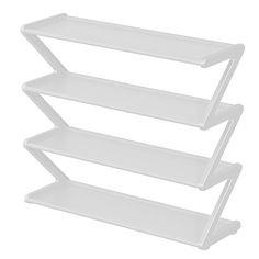 three white shelves are stacked on top of each other