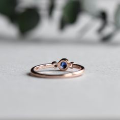 Genuine sapphire-adorned three stone ring. 14k Rose gold fully hallmarked 3mm blue Sapphire center stone. 1.75mm White Sapphires Approx 1.5mm band width FREE SHIPPING USA- All of our jewelry will arrive in custom packaging ready for gift giving. LEAD TIME: Made to order will take 10-14 days. Signature upon delivery, we unfortunately will not be able to reimburse or replace lost or stolen shipments. FOLLOW US ON: Instagram: @roseandchoc Facebook: /Roseandchoc Pinterest: @Roseandchoc Rose Gold Round Cut Sapphire Ring, Rose Gold Sapphire Ring With Round Cut, Rose Gold Sapphire Ring With Gemstone, Dainty Rose Gold Sapphire Birthstone Ring, 14k Rose Gold Sapphire Promise Ring, Minimalist Rose Gold Sapphire Ring Birthstone, 14k Rose Gold Sapphire Ring Fine Jewelry Gift, 14k Rose Gold Sapphire Gemstone Ring Gift, 14k Rose Gold Sapphire Ring Gift