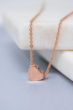 Dainty and stylish Rose gold small Heart charm necklace is great to wear for everyday or special occasions Available in rose gold SIZE ♥ Chain Length : 16.5 '' ( as pictured ) Please you can CHOOSE your chain length( 15 inches - 18 inches ) before purchasing this item ! * necklace sizes * 15 inches: around neck 16 inches: standard short 17 inches: average length 18 inches: standard long SHIPPING TIME Fast shipping within 1 - 3 days **Your order will be ready to be shipped within 3 business days Rose Gold Charm Necklace With Heart Pendant, Rose Gold Heart Pendant Charm Necklace With Delicate Chain, Rose Gold Heart Necklace With Delicate Chain, Everyday Rose Gold Heart Pendant Necklace, Minimalist Rose Gold Heart Pendant Charm Necklace, Minimalist Rose Gold Heart Necklace With Delicate Chain, Minimalist Rose Gold Heart Charm Necklace, Minimalist Rose Gold Charm Necklaces For Valentine's Day, Everyday Rose Gold Charm Necklace For Valentine's Day