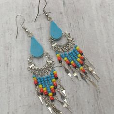 Spirit Of Nature Turquoise Teardrop Earrings Set Colorful Teardrop Dangle Earrings Set Handcrafted Design Hangs 3 1/2" Teardrop Measures 3/8" Wide X 5/8" Long Dangles Have Turquoise, Yellow, Orange, Red & Black Beads Stone Southwest Earrings Made In Peru Turquoise Beaded Earrings With Dangling Beads For Festivals, Turquoise Beaded Dangle Earrings For Festival, Turquoise Beaded Drop Earrings For Festival, Turquoise Drop Earrings With Colorful Beads, Bohemian Beaded Blue Teardrop Earrings, Festival Turquoise Beaded Drop Earrings, Bohemian Blue Beaded Teardrop Earrings, Turquoise Teardrop Beaded Earrings For Gifts, Turquoise Teardrop Beaded Earrings As Gift