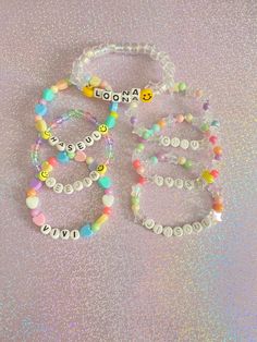 If you stan Loona, then customize your own Loona kpop bracelet! Choose from 4 different designs and select your wrist size below. Check out our kpop jewelry section for more unique designs❤️. *4 different designs available: pastel hearts & beads, clear pastel beads, clear iridescent beads, stars & pastels *Stretchy  *Add a name below in the personalization box If you have any questions, please don't hesitate to ask! We are friendly:) Visit our official website: www.yeetincolorboutique.com and follow us on Instagram: @yeetincolorboutique Affordable White Kpop Beaded Bracelets, Trendy White Jewelry For Personalized Gift, Adjustable Beaded Kpop Bracelets, Trendy Letter Beads Jewelry For Friendship, Trendy Beaded Bracelets With Letter Beads, Trendy Customizable Name Bracelet For Personalized Gift, Trendy Beaded Jewelry For Birthday, Trendy Beaded Jewelry For Birthdays, Adjustable Kpop Bracelets With Letter Beads