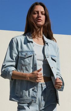 Upgrade your casual ensemble with the Denim Trucker Jacket from PacSun. Crafted from rigid denim, this timeless piece features a button-down front closure, classic collar, button-flap chest pockets, and side hand pockets, offering both style and versatility for your everyday wear.


	Light indigo wash
	Rigid fabric
	Collar
	Long sleeves
	Button-down front closure
	Button-flap chest pockets
	Side hand pockets
	Relaxed fit
	100% cotton
	Machine washable
	Model is wearing a size small
	Model measurements: 5’9” height, 32” bust, 24” waist, 34” hip Trucker Jacket Women, Slim Fit Cargo Pants, Denim Trucker Jacket, Womens Denim, Jeans Kids, Kids Swimwear, Slim Fit Pants, Trucker Jacket, Going Out Dresses