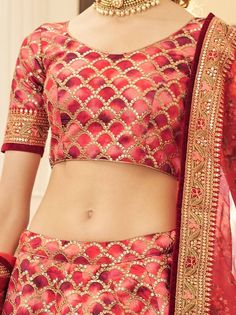 Be a stunner and make your fashion game stronger by wearing this beautiful red color lehenga produced with art silk material assemble with sequins work, dori work, and lace border work. This red lehenga comes with a similar color art silk material choli created with dori work and sequins work. It also comes with a similar color organza dupatta made with floral printed and lace border work. This amazing red traditional lehenga is semi-stitched can fit up to 42 inches and comes with fully unstitch Red Art Silk Sharara For Navratri, Red Art Silk Sharara For Diwali, Red Embroidered Fabric For Unstitched Blouse For Diwali, Red Art Silk Sets With Resham Embroidery, Red Banarasi Silk Lehenga With Intricate Embroidery, Red Banarasi Silk Set With Resham Embroidery, Red Dola Silk Lehenga With Dupatta, Fitted Red Banarasi Silk Sharara, Festive Red Sharara With Unstitched Blouse