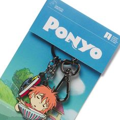 a keychain with an image of ponyo on it