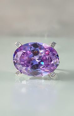 ★Lavender Amethyst Ring, Large Oval Ring, Cocktail Rings Women, Amethyst/Solitaire Statement Ring, Large Gemstone Ring, Lavender Cocktail Ring. ----- This ring is ready to ship within 3 business days. ----- ★★This oval cut large ring is set with a giant lavender beautiful Amethyst.  The gemstone is faceted in a brilliant cut, big and impressive.  It is a big gemstone, chosen for a statement. A glowing ring that will shine for a special woman. It is accented with 4 white brilliant synthetic white diamonds (cubic zirconia).  This gemstone ring will make makes the day shine.💥  ★This ring can be personalized with other gemstones like : Blue Topaz, Amethyst, Garnet, Emerald, Sapphire, Moon  stone, Citrine, Pearl, Aquamarine, Tourmaline, Peridot, and more... Also available in 14k solid gold. 🎁 Purple Amethyst Oval Diamond Ring, Oval Purple Amethyst Ring With Center Stone, Oval Amethyst Ring With Center Stone, Oval Purple Diamond Ring With Gemstone Accents, Oval Amethyst Ring With Large Stone, Purple Oval Topaz Ring For Anniversary, Oval Purple Gemstone Rings, Purple Oval Diamond Ring With Accent Stones, Purple Oval Crystal Ring For Anniversary