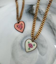 🌹 Vintage heart each uniquely hand painted with a pink rose in the center. Strung on a deep, gold tone rounded box chain. 💖 Add a vintage, rose quartz candy heart to complete the charm necklace look! These mini glass hearts were made in Japan in the 1950s/1960s. ✦ Check out nctrnlcollection.com! ✦ Follow @_nctrnlofficial on Instagram for promos and early releases! ✴ JEWELRY CARE ✴ * Avoid contact with water, perfume, or chemicals. * Take jewelry off before showering, exercising, cleaning, etc. Vintage Heart Pendant Charm Necklaces For Mother's Day, Vintage Heart Pendant Charm Necklace For Mother's Day, Vintage Rose Design Necklaces For Valentine's Day, Valentine's Day Vintage Charm Necklaces, Vintage Heart Charm Necklaces For Valentine's Day, Retro Heart-shaped Jewelry Gift, Retro Heart-shaped Jewelry For Valentine's Day, Vintage Heart Pendant Charm Necklace For Valentine's Day, Vintage Charm Necklace For Valentine's Day