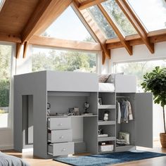 a loft bed with an open storage compartment