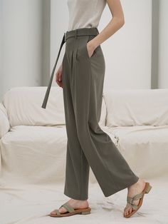 - Simple and modern design- Straight and trendy fit- D belt on waist- Point of pintuck Measurement(S/ M/ L)- Waist: 26.7/ 28.7/ 31.2in.- Hip: 37/ 38.9/ 40.9in.- Length: 40.1/ 40.3/ 40.5in.- Model height: 5.7ft.- Model chest: 31.1in.- Model waist: 24.4in.- Model hips: 33.8in.Composition- 80% Tencel, 16% Rayon, 4% Span- Dry CleaningDesigner- Imported- By RE RHEE- Style#:300875519 Office High Waist Pants With Belted Cuffs, High Waist Pants With Belted Cuffs For Office, High Waist Bottoms With Belted Cuffs For Business Casual, High Waist Bottoms With Belted Cuffs For Office, Belted Pants For Work, Office Wide Leg Full Length Pants With Belt Loops, High Waist Fitted Pants With Belted Cuffs, Belted Straight Leg Dress Pants For Work, Classic High Waist Belted Bottoms