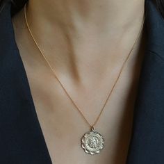 Our timeless Protector St. Christopher Necklace is the symbol of protection and guidance. The centerpiece of this necklace is a finely crafter St. Christopher charm. The Protector St. Christopher Necklace is the perfect accessory for those who seek protection and blessings through life. Protect Details: 20" 14K Gold-Filled 1mm Ball Chain 22mm 18k Gold-Filled St. Christopher Charm Water-Wearable Made in Scottsdale, AZ Everyday Spiritual Jewelry With Coin Pendant, Spiritual Everyday Necklace That Is Tarnish Resistant, Spiritual Everyday Necklace Tarnish Resistant, 14k Gold Medallion Necklace In Spiritual Style, Symbolic Tarnish Resistant Initial Pendant Necklace, Spiritual Medallion Jewelry With Si Clarity, Yellow Gold Medallion Jewelry For Blessing, Spiritual Yellow Gold Medallion Necklace As Gift, Spiritual Medallion Necklace Tarnish Resistant