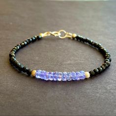 Gemstone: 4mm Natural Tanzanite & 3mm Black Spinel Faceted Natural Crystal Beads Metal: All Metal Used Is Sterling Silver Length: 7” Inches ( Custom Length Is Available) Tanzanite Is December Birthstone Tanzanite Bracelet, Lucite Bracelets, Message Necklace, 18k Gold Bracelet, Bracelets Handmade Diy, Beads Bracelet Design, Beaded Jewelry Designs, Beading Ideas, Sterling Silver Jewelry Handmade