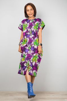 "Purple Ankara dress | African Print shirt Dress | holiday resort dress | Women's summer cotton dress  This women's dress is from a quality Ankara cotton and has very tidy sewing and is made with the highest care.   Original Design and produced by NUICHAN     PRODUCT SIZE : One Size Fits Most *Chest : up to 42\" *Sleeve length : 9\" (from neckline to hem) *Waist : up to 40\"   *Hips : up to 42\" *Length : 43\" from shoulder to hem NOTE :  * Model chest : 32\", waist : 24\" hips : 35\"  * Combine Cotton Knee-length Shirt Dress For Vacation, Knee-length Cotton Shirt Dress For Vacation, Cotton Dress With Vibrant Print For Vacation, Printed Short Sleeve Shirt Dress For Beach, Summer Printed Short Sleeve Shirt Dress, Summer Cotton Maxi Dress With Vibrant Print, Summer Printed Shirt Dress With Short Sleeves, Summer Cotton Dresses With Vibrant Print, Short Sleeve Dress With Bold Print For Vacation