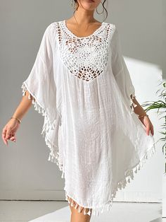 Casual V-neck Cover-up With Tassels, V-neck Beach Dress With Tassels, Beach Season V-neck Dress With Tassels, V-neck Tassel Dress For Beach Season, V-neck Dresses With Tassels For Beach Season, V-neck Tassel Beach Dress For Beach Season, V-neck Beach Dress With Tassels For Beach Season, Casual V-neck Tassel Cover-up, Beach V-neck Dress With Tassels