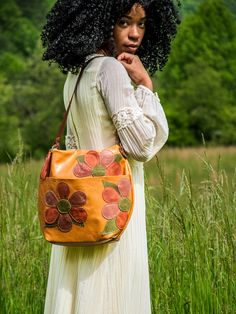 Product Description: Y'all! I am OBSESSED with this bag: The Marie! In LIMITED RUN Flower Power Eco-Tanned leather with coordinating leather tassel! This leather is everything. Comes unlined with an internal phone pocket, or choose to add a lining to your new beauty here: https://inbluehandmade.com/products/add-a-lining-to-my-new-bag-41075?_pos=1&_psq=add%20a%20lining&_ss=e&_v=1.0&variant=44005823283433 Hurry! These are limited-run! Please allow 3-4 weeks for us to make this beautiful bag by han Spring Crossbody Hobo Bag With Adjustable Strap, Bohemian Shoulder Bag With Adjustable Strap For Fall, Bohemian Bags With Adjustable Strap For Fall, Spring Hobo Bag With Detachable Strap For Daily Use, Spring Hobo Bag With Detachable Strap For Travel, Spring Crossbody Hobo Bag For On-the-go, Spring Travel Hobo Bag With Detachable Strap, Bohemian Shoulder Bag For Spring, Bohemian Style Shoulder Bag For Spring